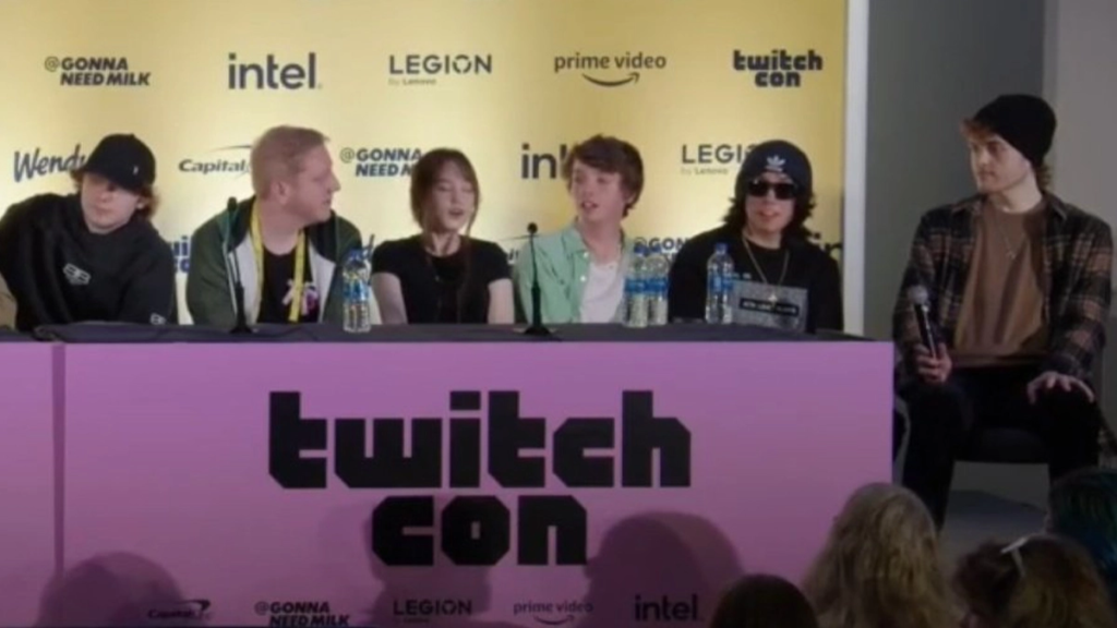 image shows Dream sitting at the right most corner in a TwitchCon panel