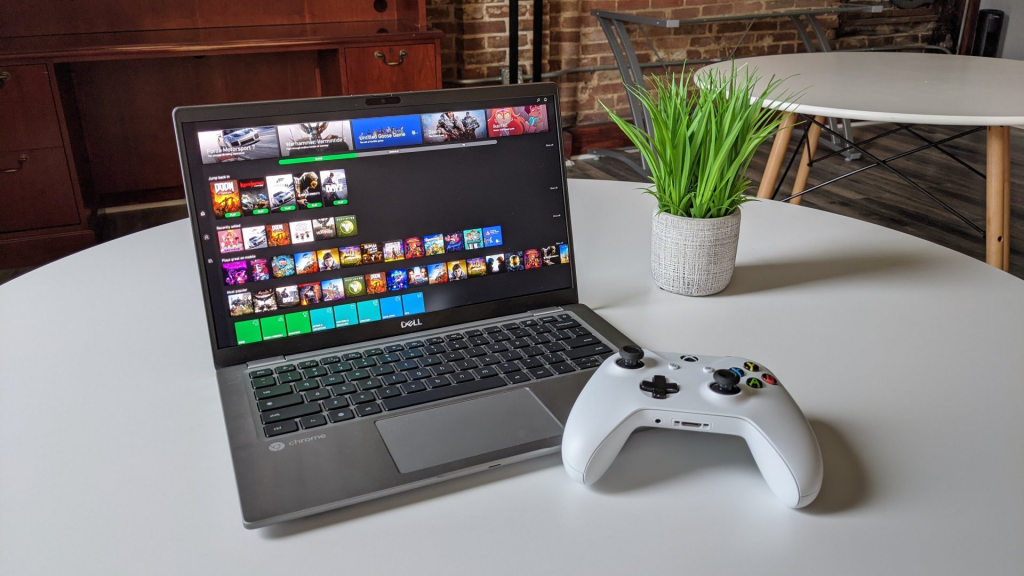 Image shows chromebook with a controller 